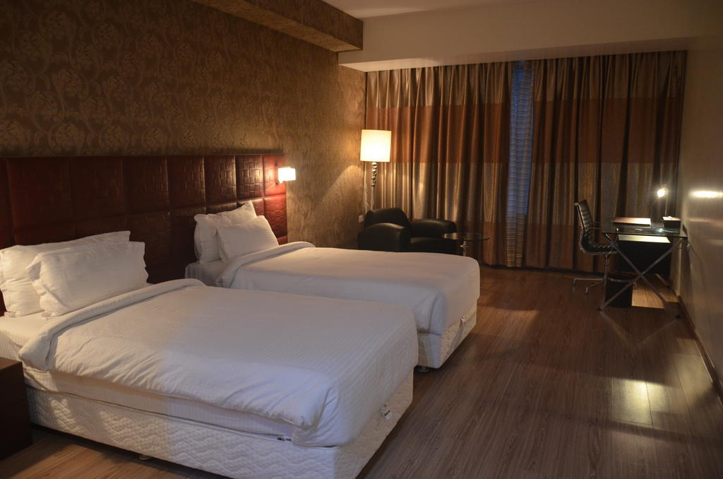 Hotel Patliputra Exotica Patna  Szoba fotó